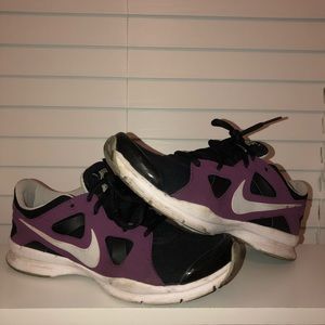 Purple nike running shoes